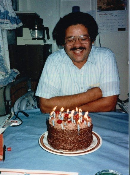 Dad enjoying life- and a sweet-looking homemade cake!- on his 29th birthday.